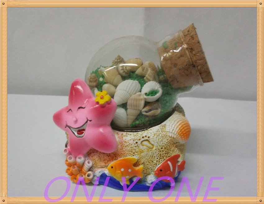 Starfish base with sand glass bottle ornament
